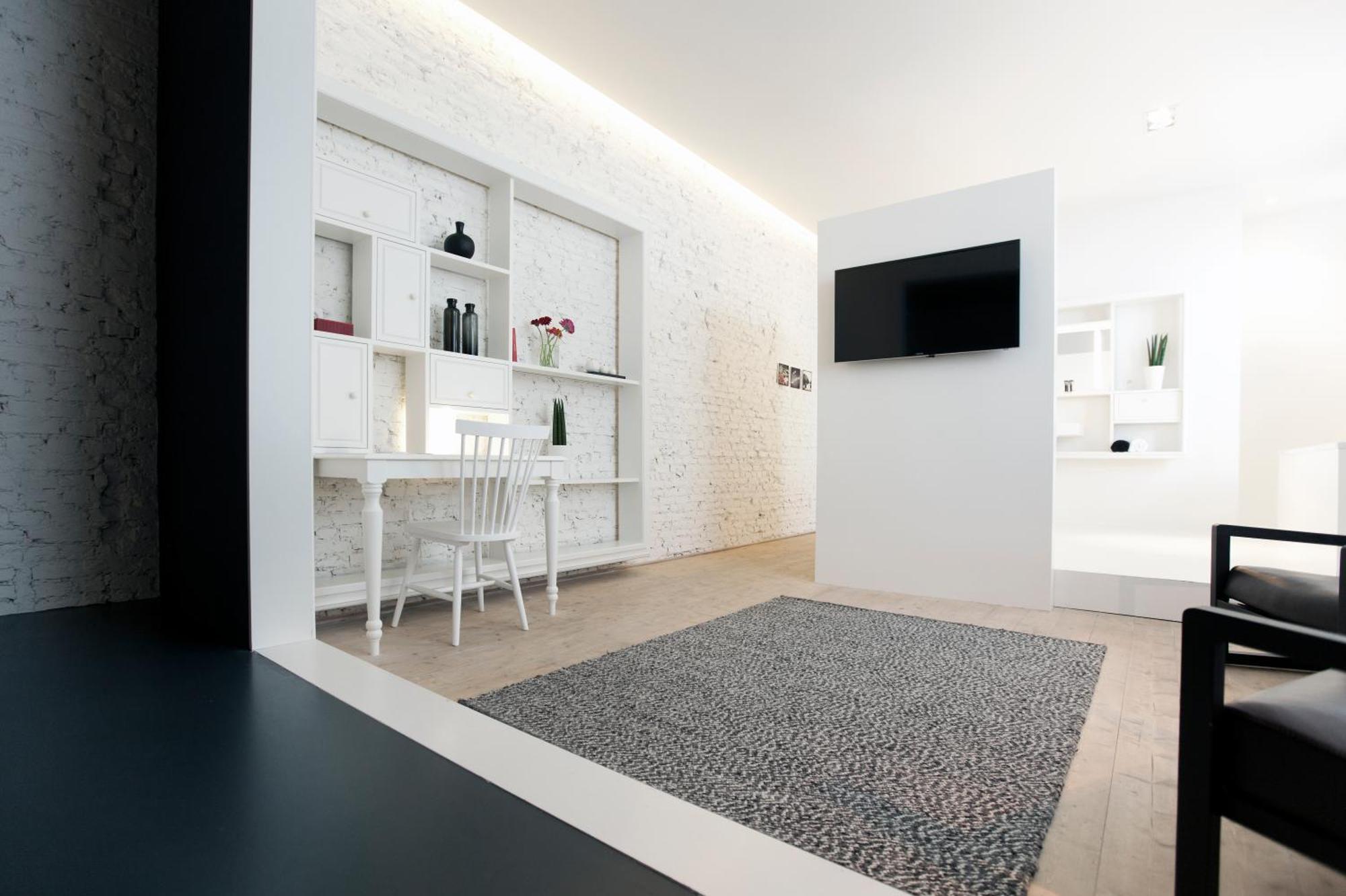 Maison Nationale City Flats & Suites Antwerpen Kamer foto A carpet