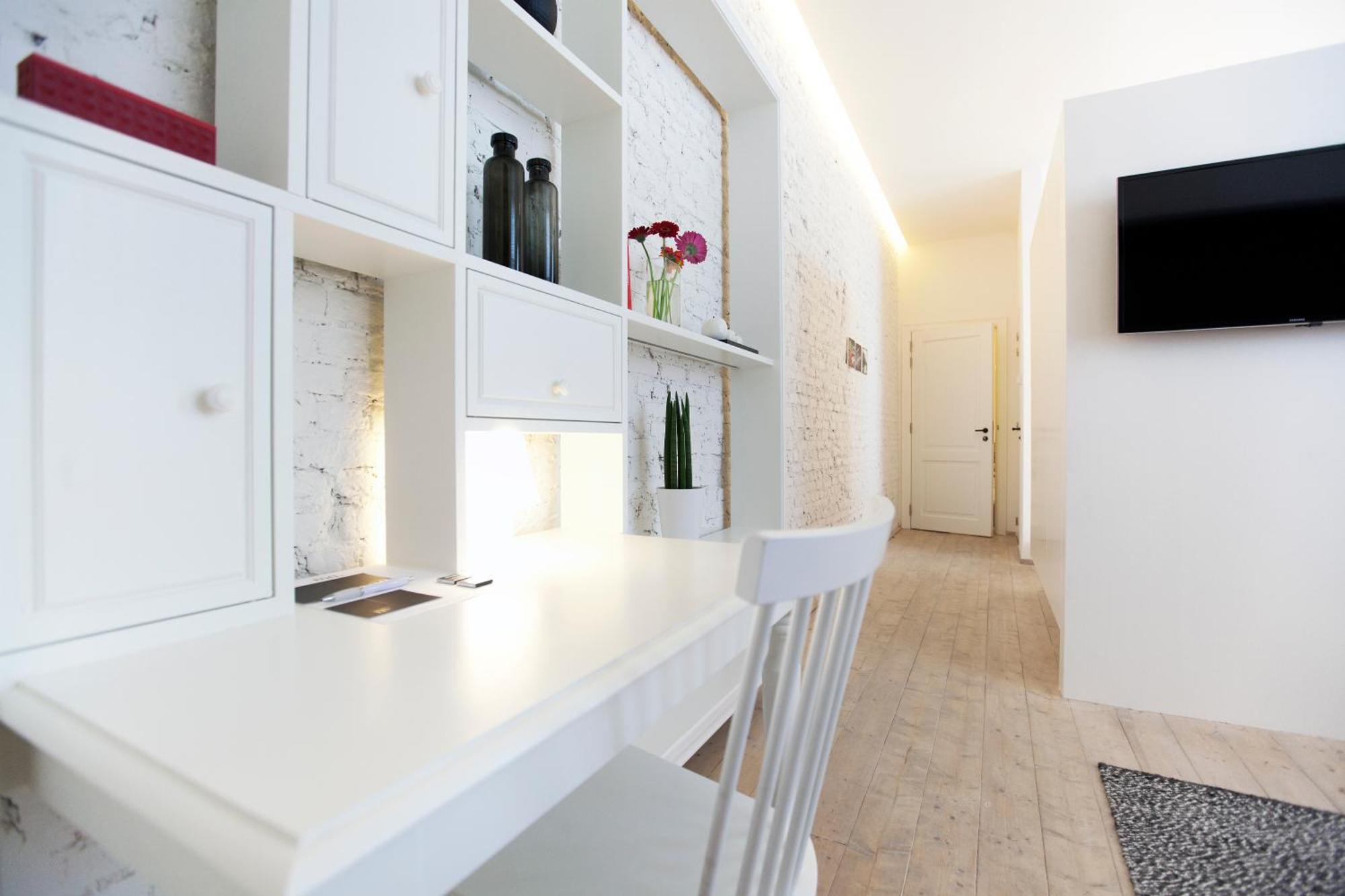 Maison Nationale City Flats & Suites Antwerpen Kamer foto A typical room at the hotel