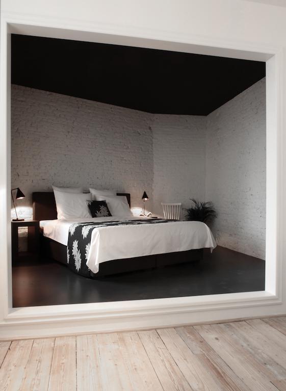 Maison Nationale City Flats & Suites Antwerpen Kamer foto A bedroom