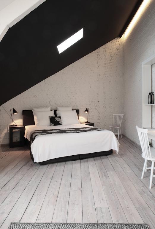 Maison Nationale City Flats & Suites Antwerpen Buitenkant foto A room at the hotel