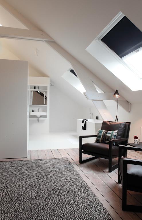 Maison Nationale City Flats & Suites Antwerpen Kamer foto A modern attic apartment